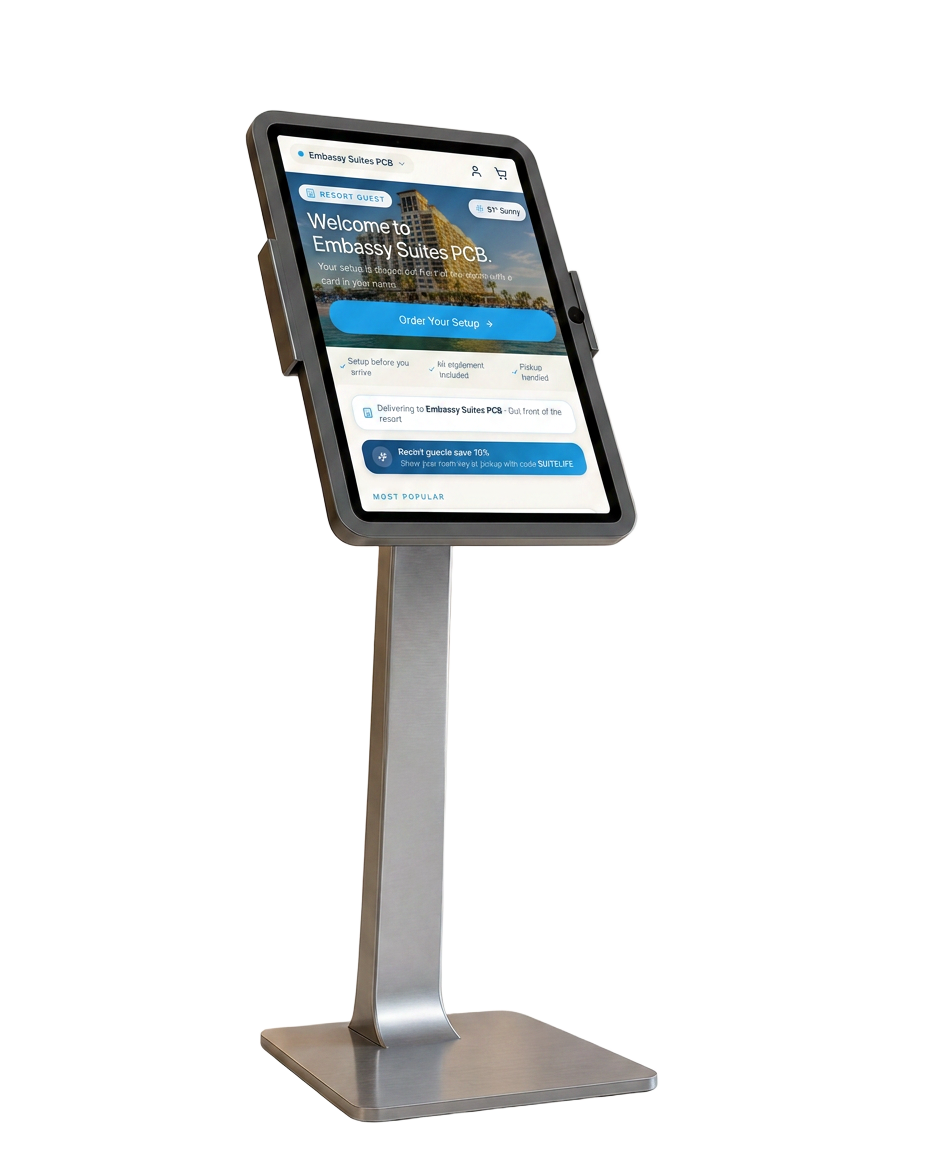 iPad kiosk on a floor stand showing the ShoreDrop home screen welcoming Embassy Suites PCB guests with an Order Your Setup button